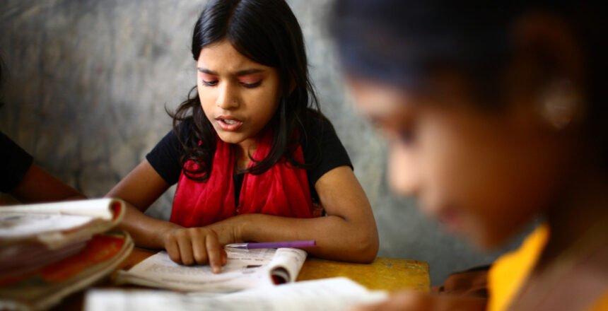 10 years old Dipa  and 12 years old Laboni  study in class two at Studying at UNIQUE CHILD LEARNING CENTRE. Mirpur